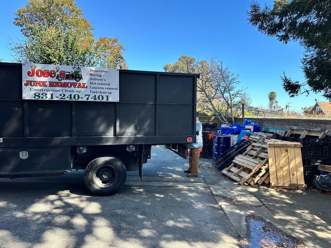 picture of dumpster truck full of junk